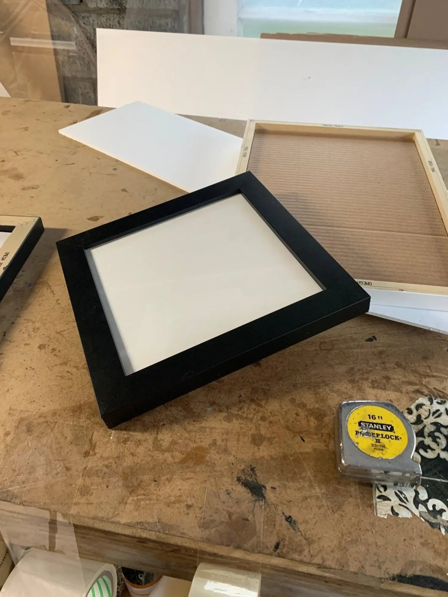 Why are picture frames so expensive? - Modern Memory Design Picture frames - NJ Frame shop Custom framing