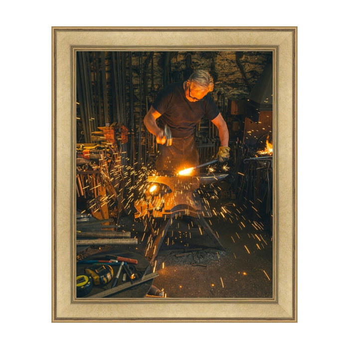 Metalworker using a grinder with sparks in a 24x30 picture frame workshop setting