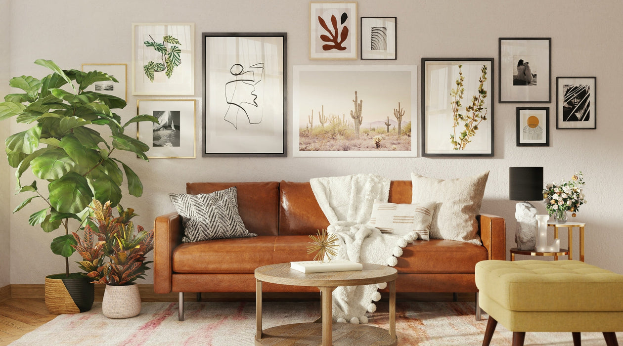 Tan leather sofa with pillows and blanket in a Brown Wood Picture Frame wall hanging